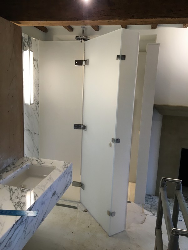 Bespoke frosted glass shower enclosure in Raynes Park luxury bathroom