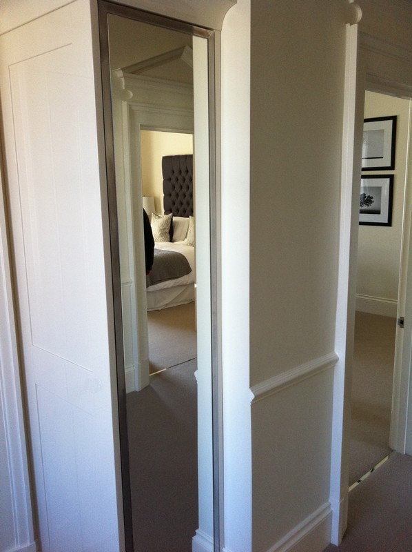 Full-length wardrobe mirror fitted in Raynes Park home